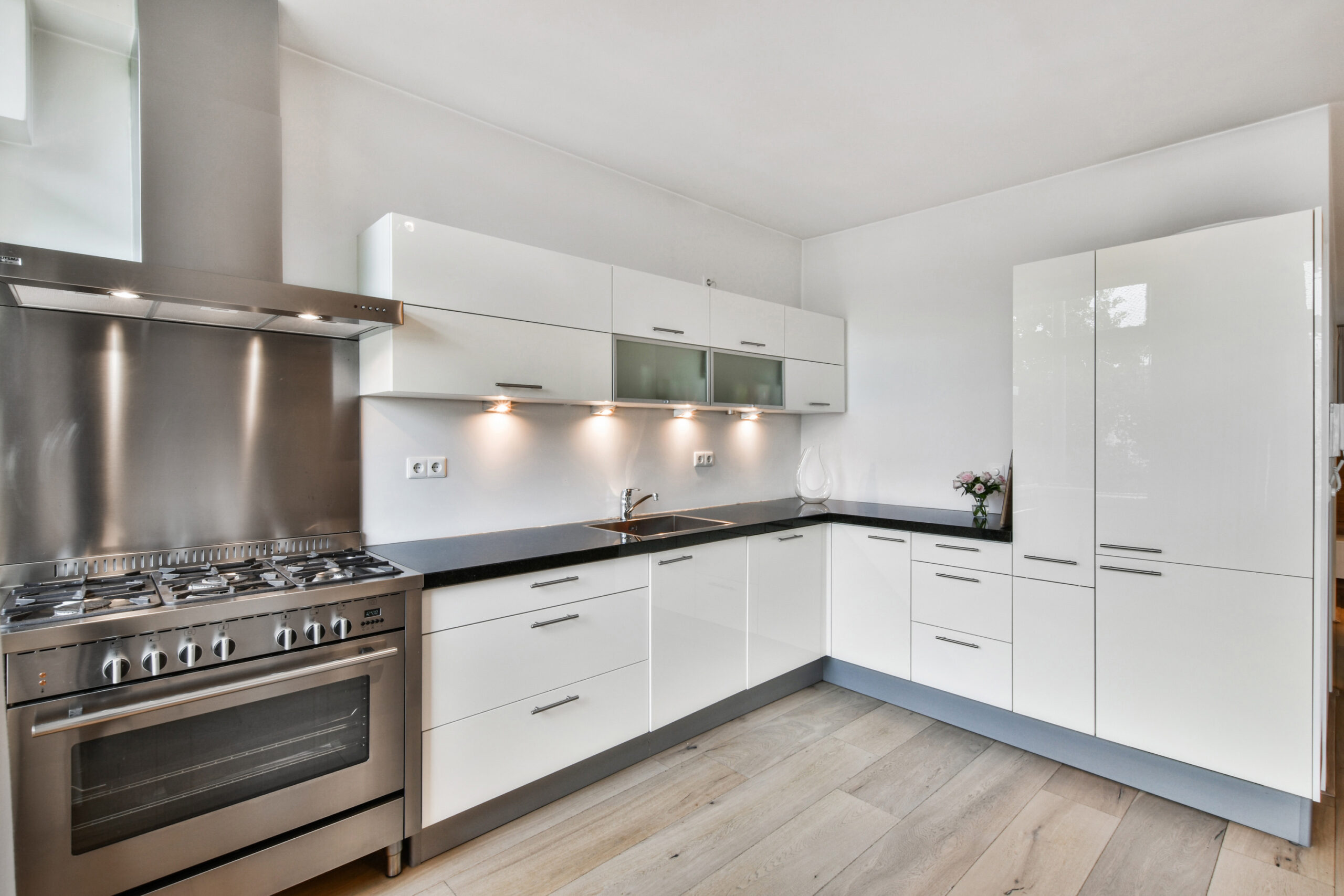 A modern kitchen interior in white colors